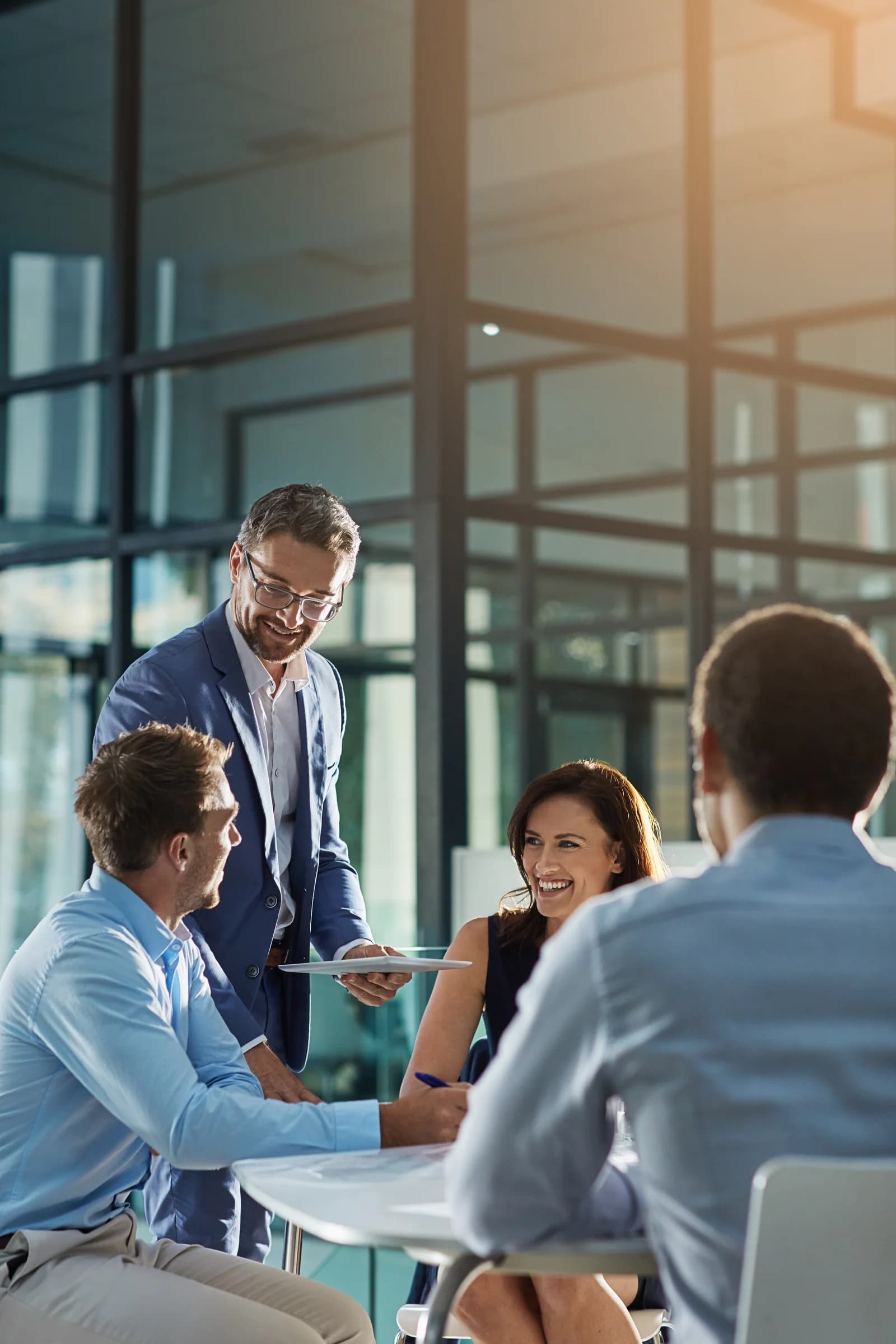 SUF Consulting advisors meeting with a client team